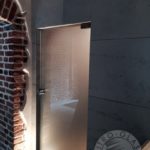 Biurowe drzwi szklane o nowoczesnym motywie firmy Vitroglass